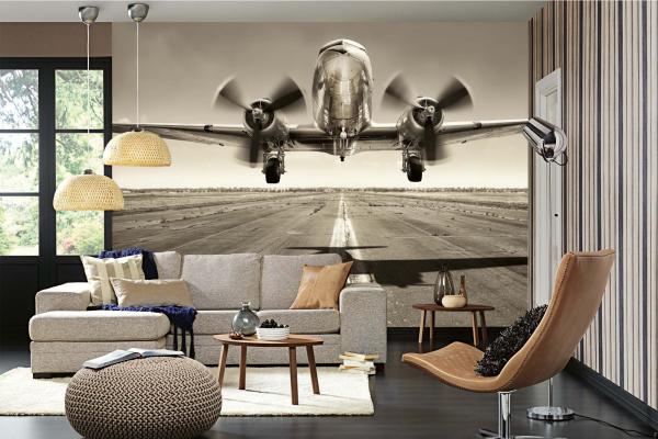 „Raumansicht mit Vlies-Fototapete MS-5-2848 – modernes Flugzeugmotiv als Wandgestaltung in Wohn- oder Arbeitsbereich“